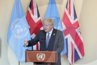 Prime Minister Boris Johnson addresses the press after attending a climate roundtable event