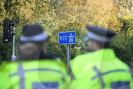 Police watch for protesters today on the M25. 