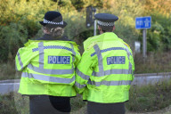 Police watch for protesters today on the M25. 
