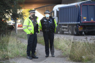 Police watch for protesters today on the M25. 