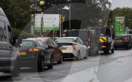Motorists queue for fuel