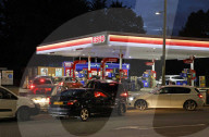 Motorists queue for fuel