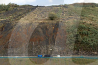 Welsh government calls on Westminster to help fund safety of coal tips. Rhondda valley residents fearful after recent landslip and UK government pushed to share responsibility
