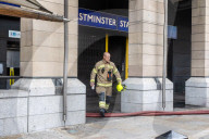 Fire at Westminster Station as severe flooding hits London after torentail rain last night. 