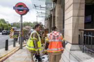 Fire at Westminster Station as severe flooding hits London after torentail rain last night. 