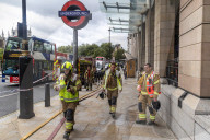 Fire at Westminster Station as severe flooding hits London after torentail rain last night. 