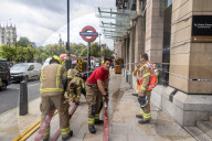 Fire at Westminster Station as severe flooding hits London after torentail rain last night. 