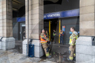 Fire at Westminster Station as severe flooding hits London after torentail rain last night. 