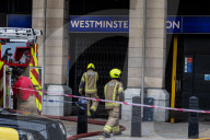 Fire at Westminster Station as severe flooding hits London after torentail rain last night. 