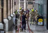 Fire at Westminster Station as severe flooding hits London after torentail rain last night. 