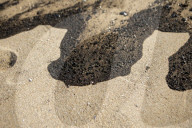 Huntington Beach oil spill blackens beaches and waves.