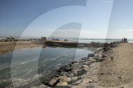 Huntington Beach oil spill blackens beaches and waves.
