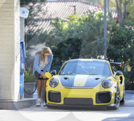 PREMIUM EXCLUSIVE Caitlyn Jenner out in nice yellow Porsche