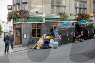 Garbage fills the streets as Brighton refuse strike continues.