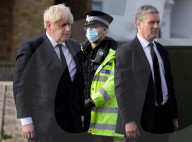 Boris Johnson and Priti Patel pay respects to Sir David Amess