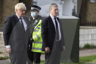 Boris Johnson and Priti Patel pay respects to Sir David Amess