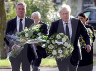 Boris Johnson and Priti Patel pay respects to Sir David Amess