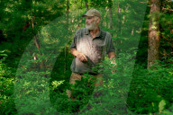 John Rucker and his dogs battle extreme weather, snakes and tough terrain to track turtles as their habitat is increasingly under threat.