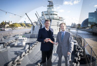 Rodney Morgan-Giles is handing over the Captain’s pennant to Nigel Steel - head of content on HMS Belfast and IWM curator. 