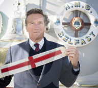 Rodney Morgan-Giles is handing over the Captain’s pennant to Nigel Steel - head of content on HMS Belfast and IWM curator. 