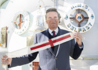 Rodney Morgan-Giles is handing over the Captain’s pennant to Nigel Steel - head of content on HMS Belfast and IWM curator. 