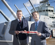 Rodney Morgan-Giles is handing over the Captain’s pennant to Nigel Steel - head of content on HMS Belfast and IWM curator. 