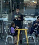 John Legend is seen spending Sunday afternoon with his two kids; 5-year-old Luna and and 3-year-old Miles at an ice cream shop in Los Angeles. 