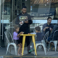 John Legend is seen spending Sunday afternoon with his two kids; 5-year-old Luna and and 3-year-old Miles at an ice cream shop in Los Angeles. 