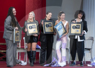 Six The Musical celebrate their global success.