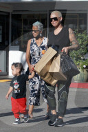 Amber Rose takes her two children, Sebastian and Slash shopping for Halloween costumes at a local shopping mall.