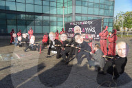 Activists begin Squid Game protest at COP26.
