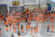Commuters stop for the two minute silence for the fallen heroes of World War One on Armistice Day at Waterloo Station, London.