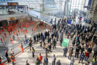 Commuters stop for the two minute silence for the fallen heroes of World War One on Armistice Day at Waterloo Station, London.