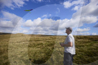 Gliders in Lancashire: model aircraft enthusiasts.
Guardian photojournalist Christopher Thomond spent some time with model aircraft enthusiasts who were launching their slope-soaring gliders off the hillside at Nick of Pendle.