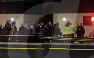 Armed Police detain soemone outside  the House of Commons