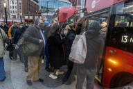 Commuters struggle for buses during RMT Tube Strike London.