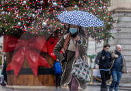 Christmas shoppers in face masks in London’s West End. 