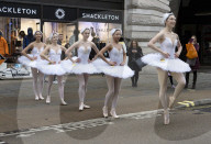 Ballet dancers and Christmas shoppers