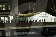 Londoners join pre-dawn queues for Covid booster vaccine.