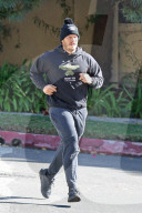 Chris Pratt is seen going for a run around his Los Angeles neighborhood. 