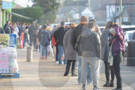 Vaccination queue at the Cullimore Pharmacy in North London 
