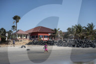 Can the Gambia turn the tide to save its shrinking beaches? In a developing country reliant on its tourist industry, the rapidly eroding ‘smiling coast’ shows the urgent need for action on climate change.