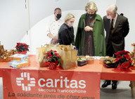 Philippe und Mathilde bei einer Weihnachtsaktion für die Flutopfer in Verviers