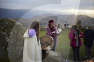 Winter solstice 2021 celebrations. Dawn at Castlerigg stone circle near Keswick, Cumbria.  Revellers in England and Ireland mark the shortest day of the year and official first day of winter.