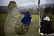 Winter solstice 2021 celebrations. Dawn at Castlerigg stone circle near Keswick, Cumbria.  Revellers in England and Ireland mark the shortest day of the year and official first day of winter.