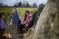 Winter solstice 2021 celebrations. Dawn at Castlerigg stone circle near Keswick, Cumbria.  Revellers in England and Ireland mark the shortest day of the year and official first day of winter.