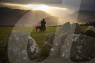 Winter solstice 2021 celebrations. Dawn at Castlerigg stone circle near Keswick, Cumbria.  Revellers in England and Ireland mark the shortest day of the year and official first day of winter.