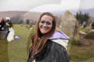 Winter solstice 2021 celebrations. Dawn at Castlerigg stone circle near Keswick, Cumbria.  Revellers in England and Ireland mark the shortest day of the year and official first day of winter.