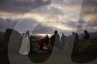 Winter solstice 2021 celebrations. Dawn at Castlerigg stone circle near Keswick, Cumbria.  Revellers in England and Ireland mark the shortest day of the year and official first day of winter.
