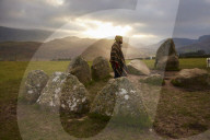 Winter solstice 2021 celebrations. Dawn at Castlerigg stone circle near Keswick, Cumbria.  Revellers in England and Ireland mark the shortest day of the year and official first day of winter.